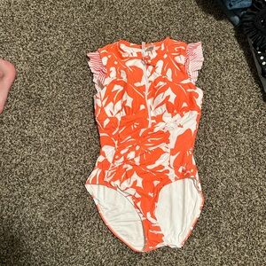 One piece swimsuit from dillards! Super cute! Size 12. Hygienic liner/tags on!